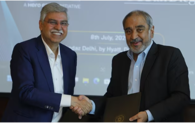 Chancellor Khosla and BML Leader Shake Hands at MOU Signing